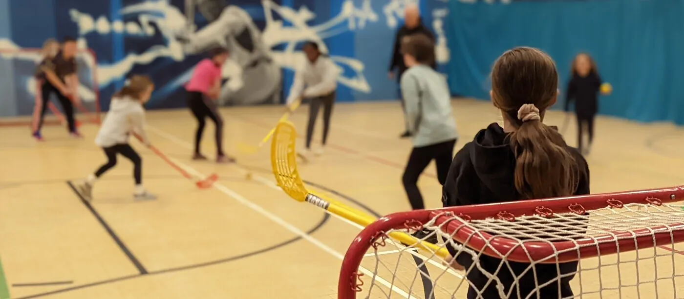 Children playing sports at Brendon Lawrence Sports Centre