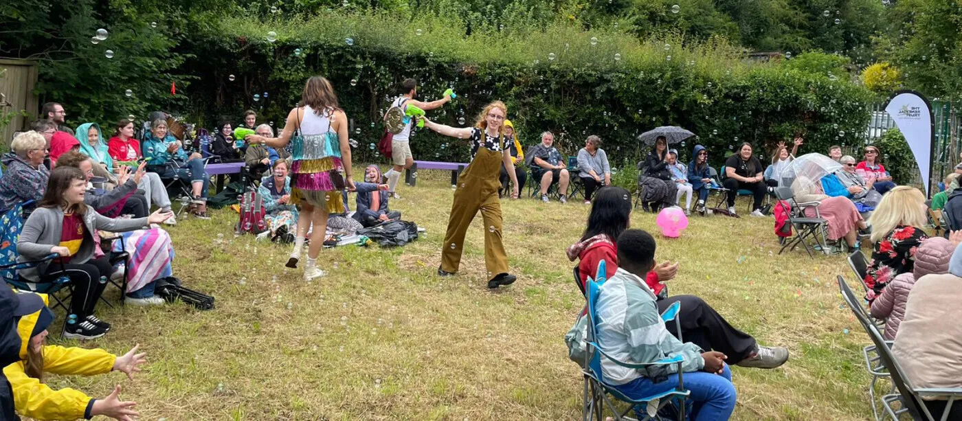 People playing and relaxing in a park